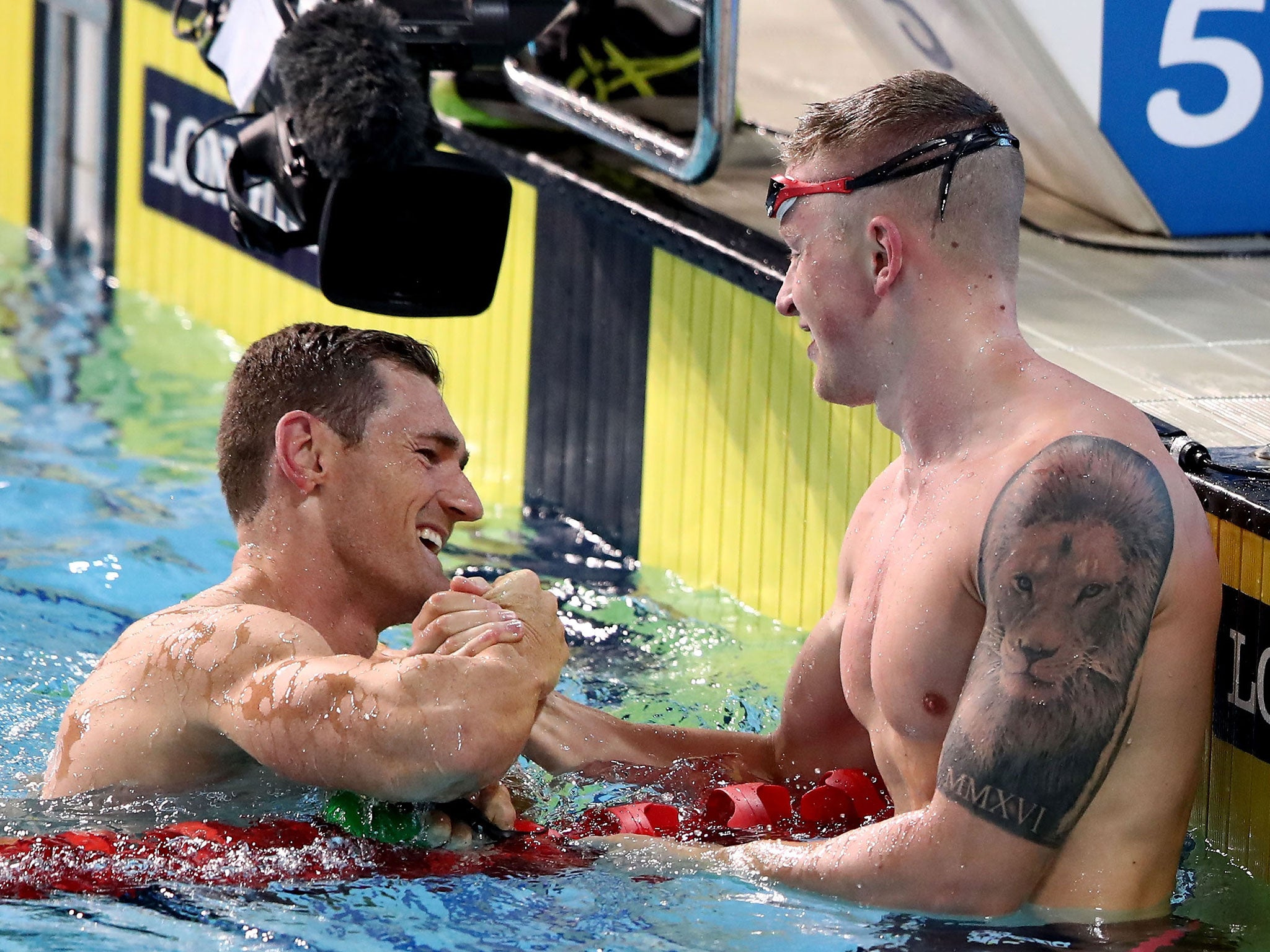 Peaty congratulates his South African rival after the race