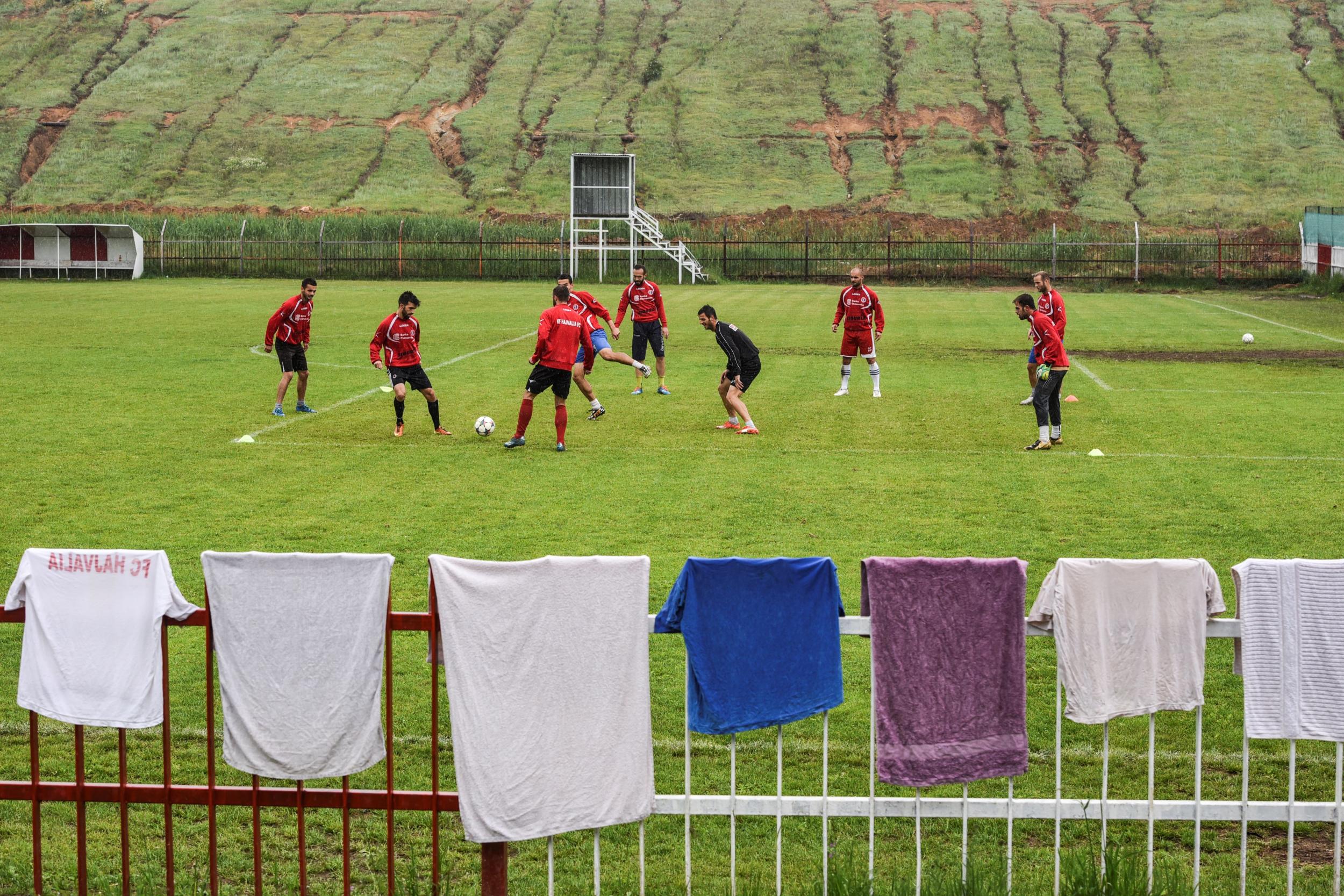 FC Hajvalia warm up during a training session near Kishnica