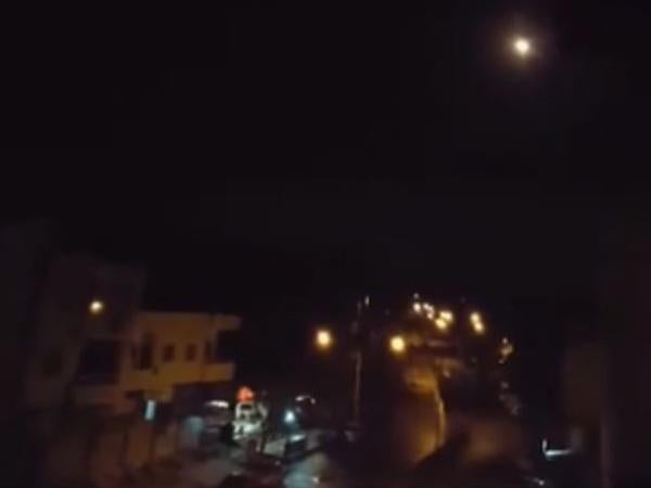 Footage appears to show missiles flying over Homs