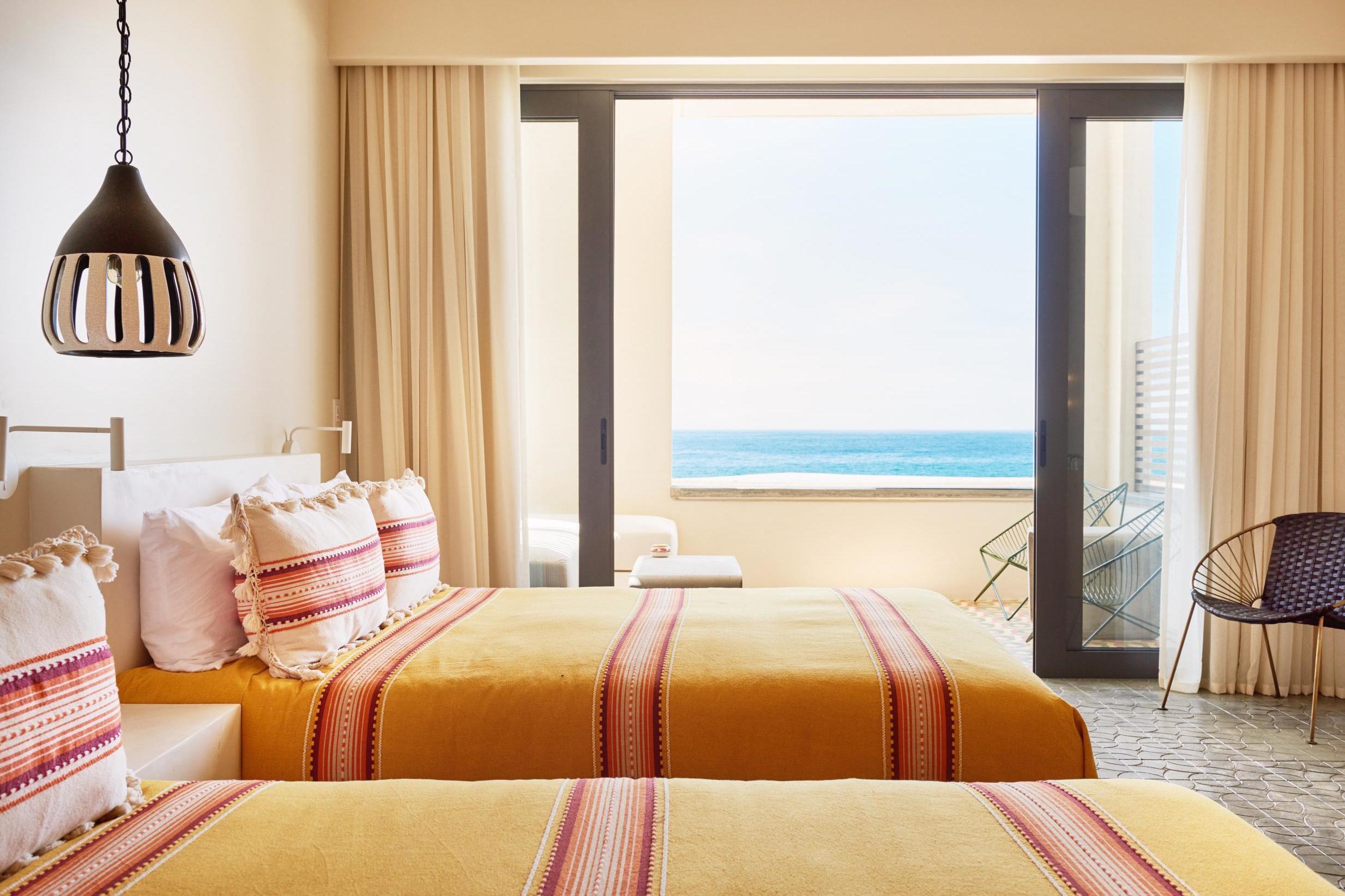 Rooms at Hotel San Cristobal Baja have 1970s-style decor and comfy beds