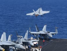 US warships sail through South China Sea amid escalating tensions