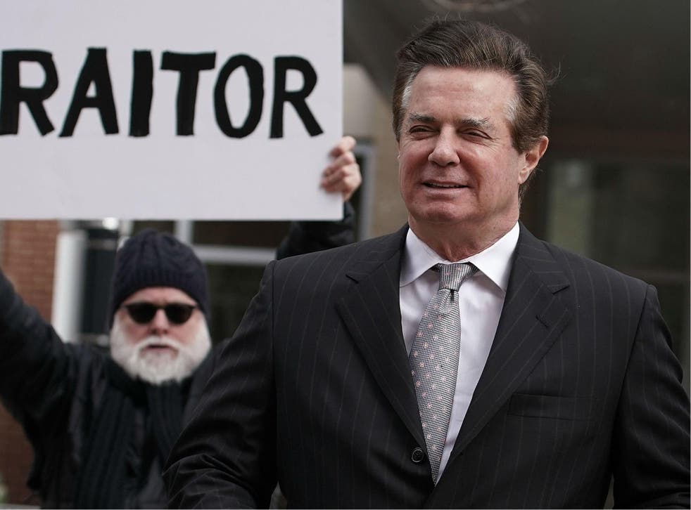 Mr Manafort pictured arriving at a federal court house in March