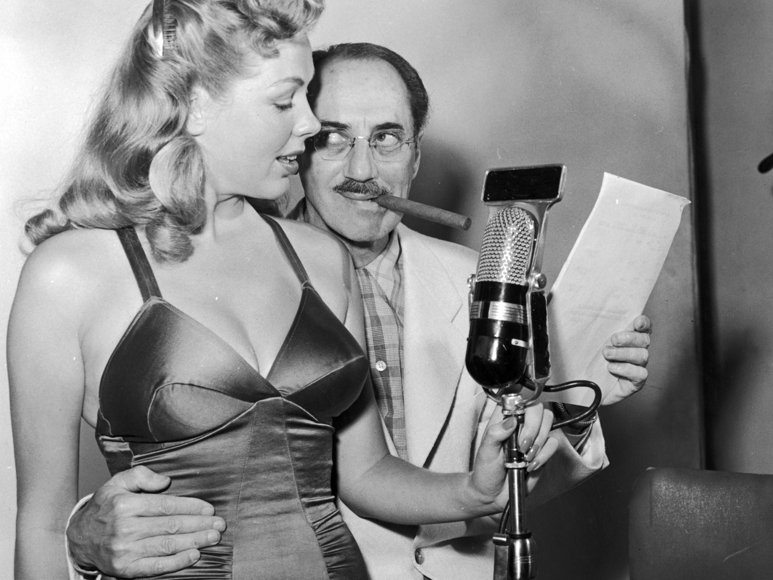 Host Groucho Marx in 1952 with a contestant on the TV quiz show ‘You Bet Your Life’