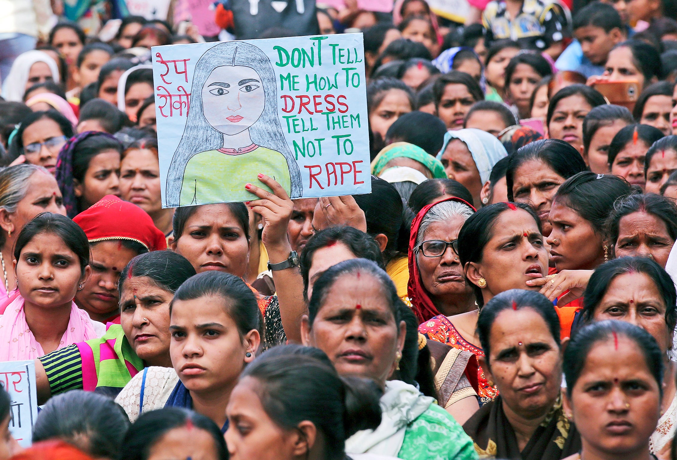 Indian people protest about the rapes in Uttar Pradesh, Jammu and Kashmir