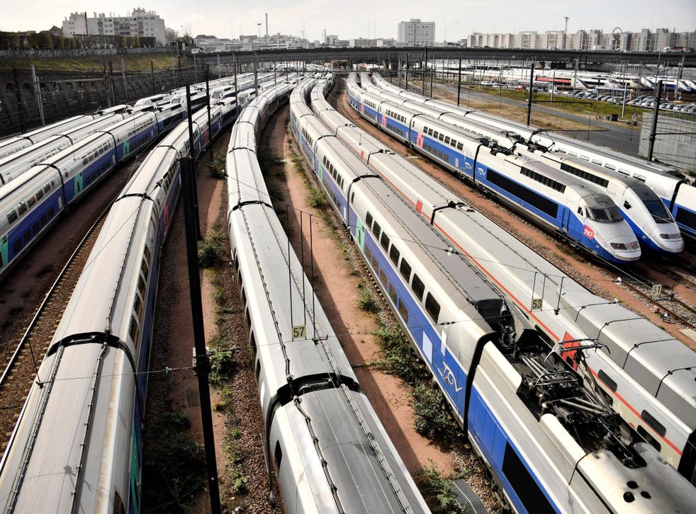 TGV high speed trains stand stationary on tracks outside the Gare de Lyon train station in Paris during rail strikes