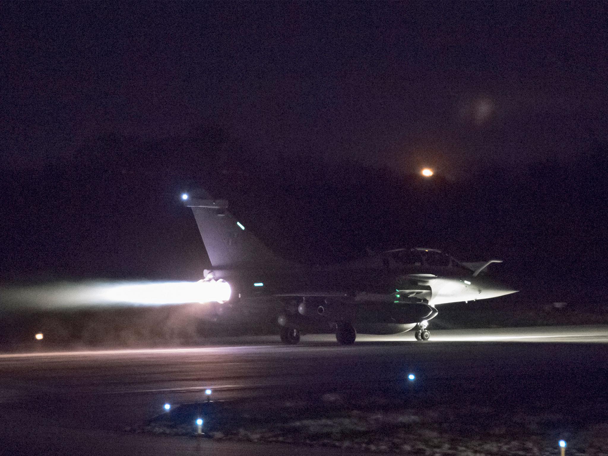 A French Dassault Rafale fighter aircraft prepares to take off for airstrikes in Syria