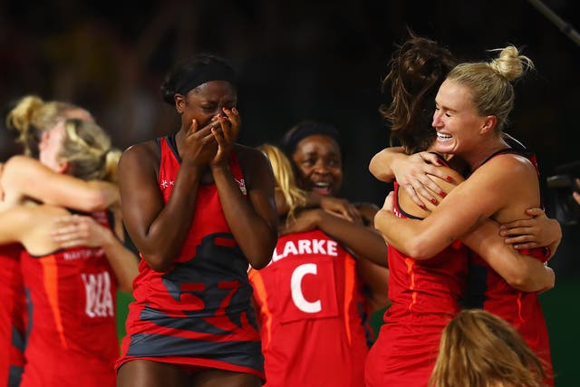 Team England celebrate reaching the netball Commonwealth Games final