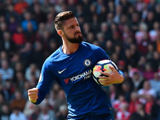 Olivier Giroud celebrates after scoring twice against Southampton