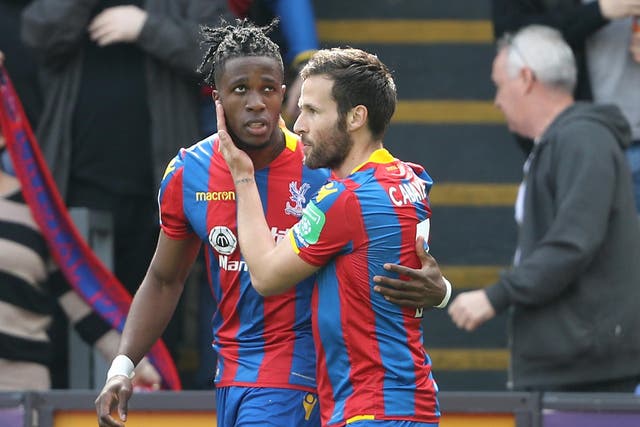 Wilfried Zaha celebrates scoring his second goal for Crystal Palace against Brighton