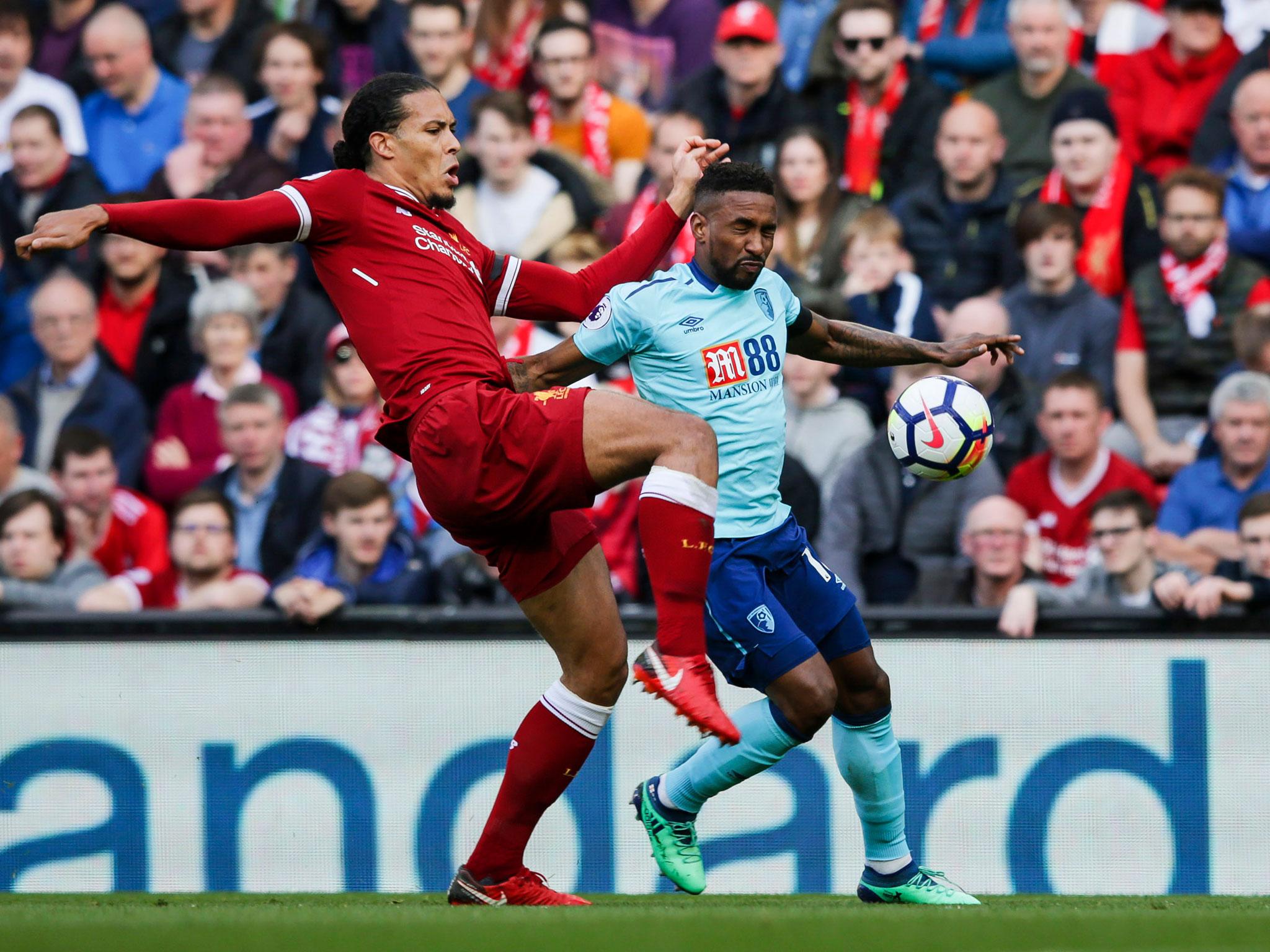 Virgil van Dijk clears under pressure from Jermain Defoe (Getty)