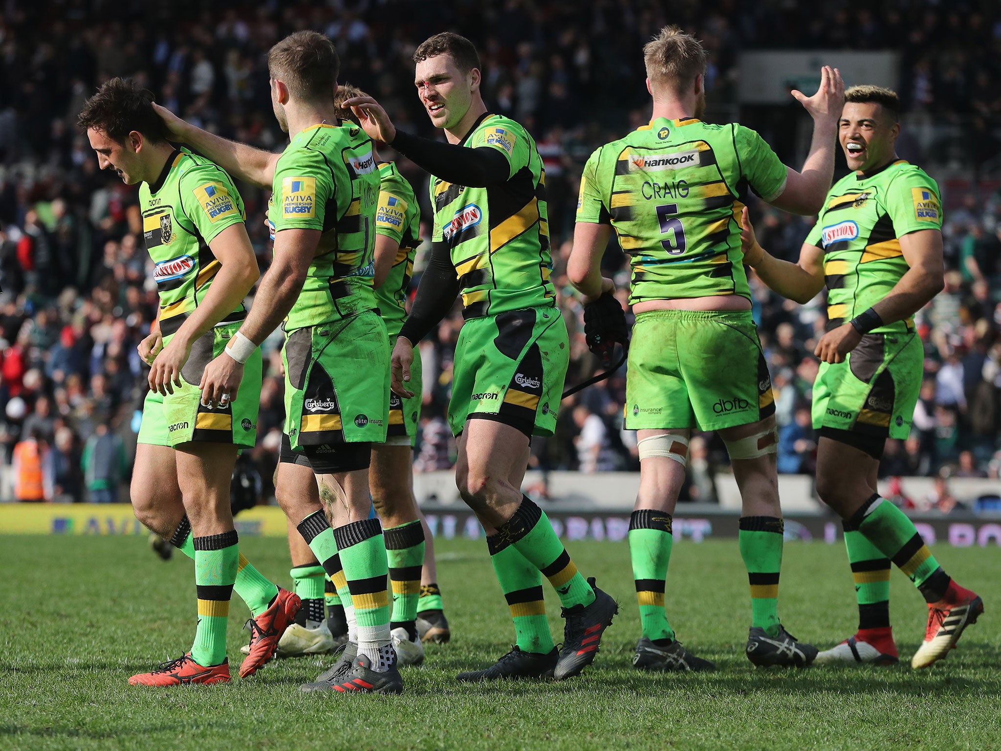 Saints celebrate their victory after the final whistle