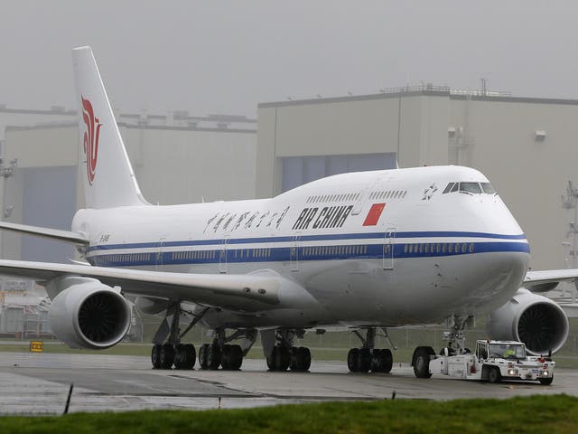 All passengers and crew on Beijing-bound Flight 1350 made it safely off the plane after it landed
