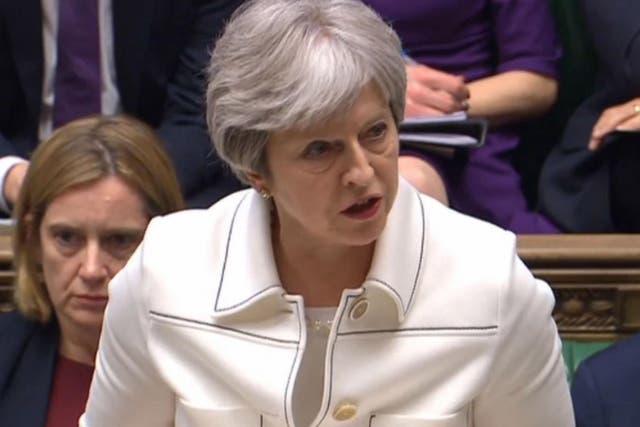 Theresa May insisted air strikes against Syria were in the UK's national interest