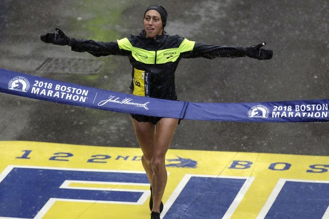 Ms Linden as she crossed the finish line in Boston Monday