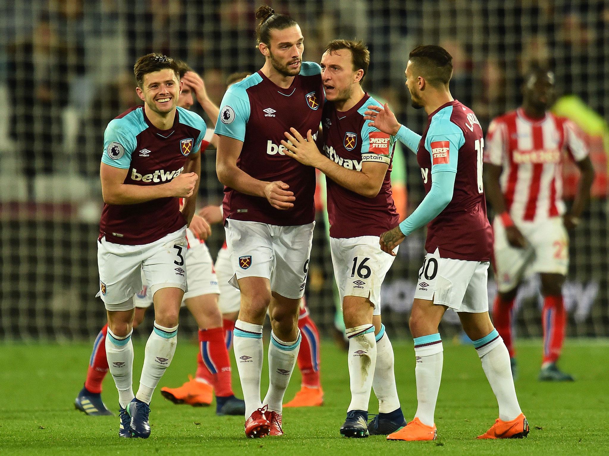 Andy Carroll's superb strike cancelled out Peter Crouch's late goal