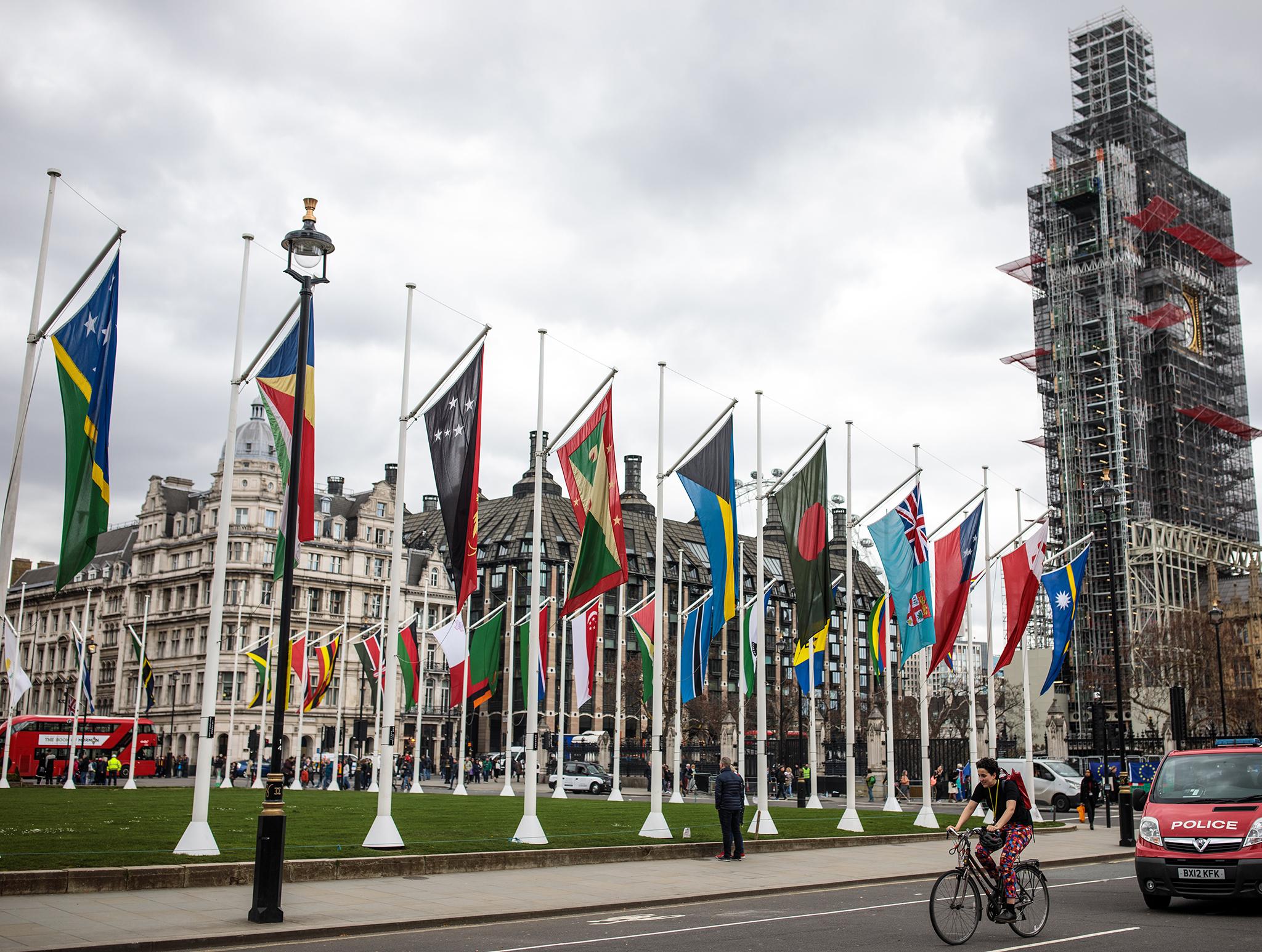 Commonwealth flags line the streets of Westminster as heads of government meet in the capital