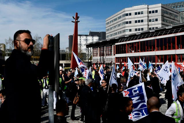 Air France employees stage a demonstration at the company's headquarters in Paris.