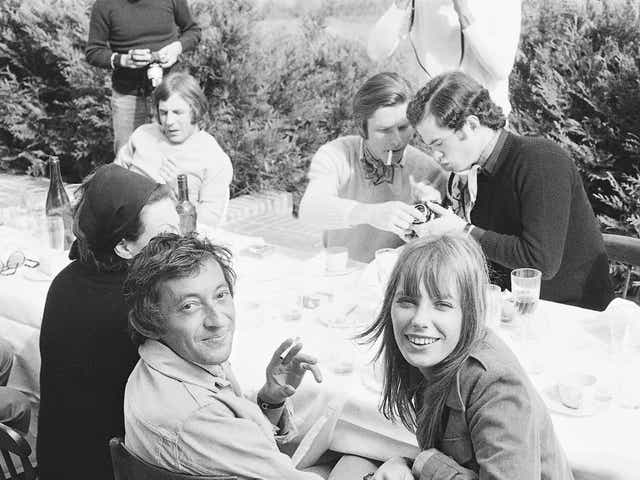 Serge entertaining Jane and infamous Parisian nightclub owner Régine during a lunch party in 1969