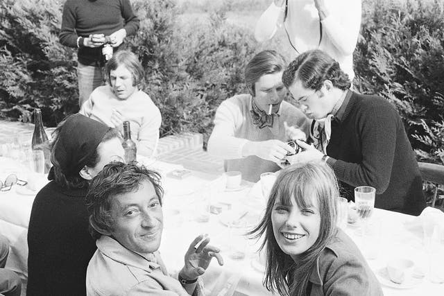 Serge entertaining Jane and infamous Parisian nightclub owner Régine during a lunch party in 1969
