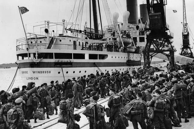 Members of the 55 Independent Squadron wait to board the Empire Windrush at Southampton, to fight in the Korean War.