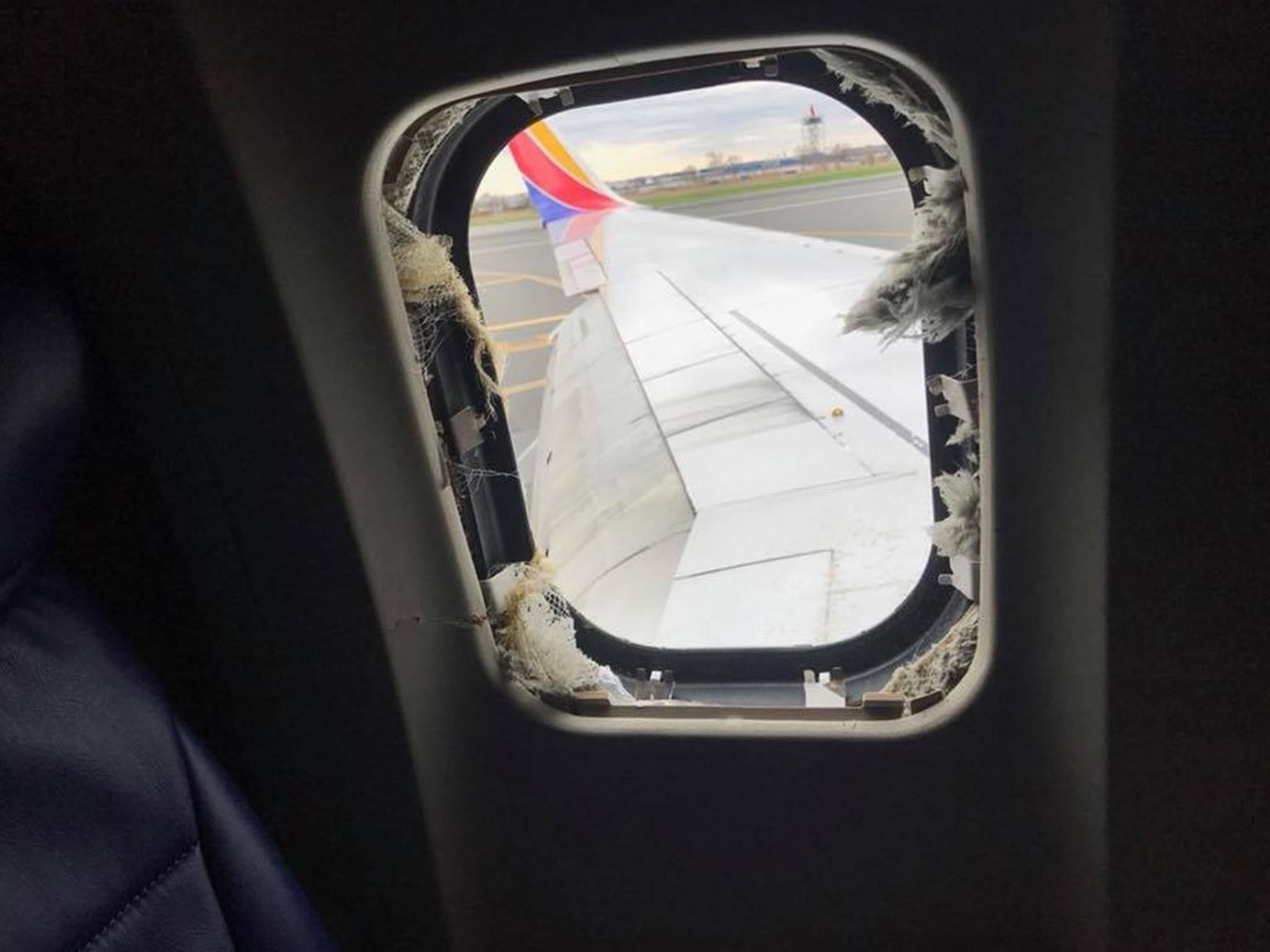 Shrapnel from the plane’s engine smashed through the plane’s window forcing and emergency landing