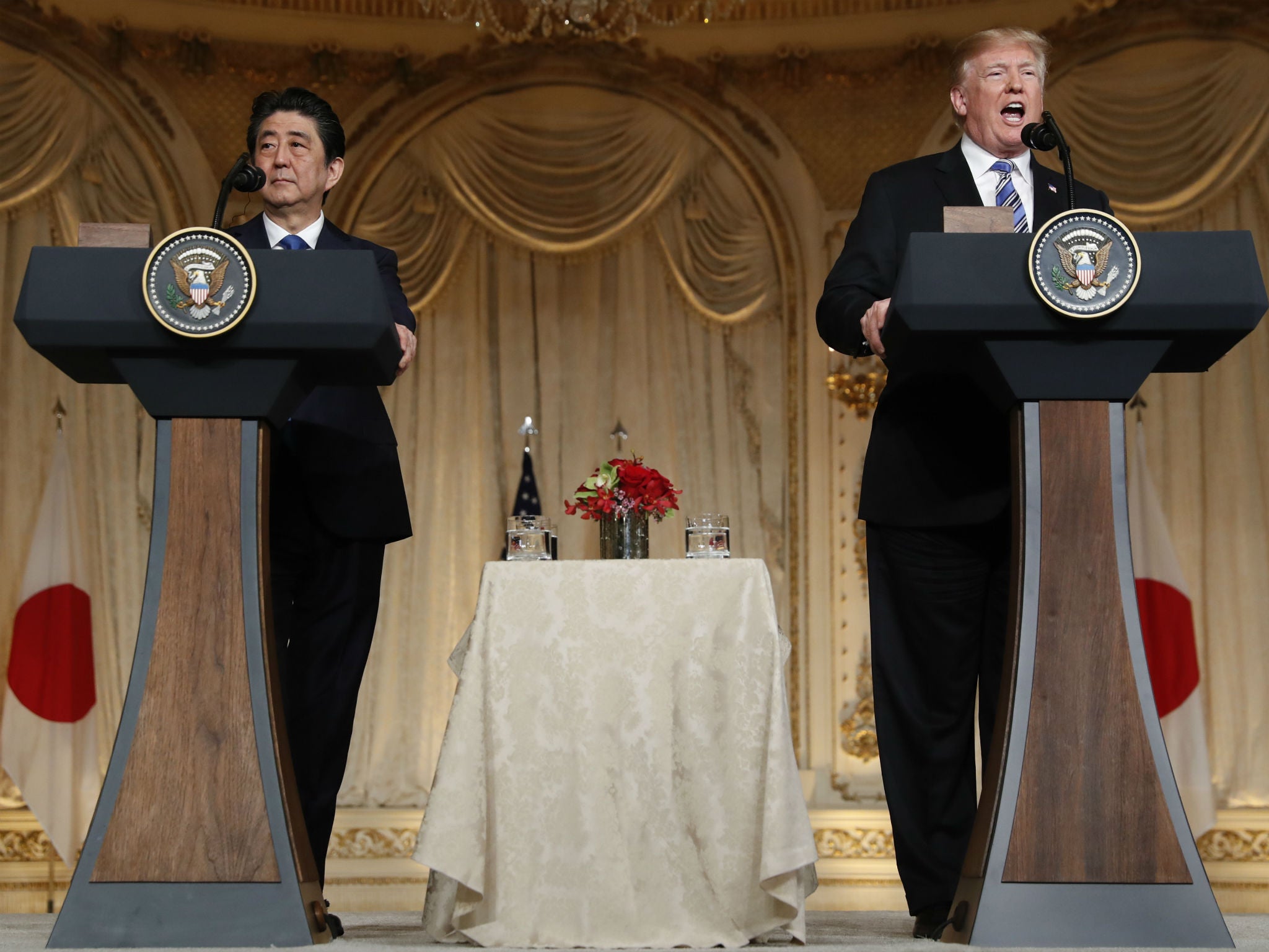 Donald Trump and Shinzo Abe speak during a news conference at Trump's private Mar-a-Lago club in Palm Beach, Florida