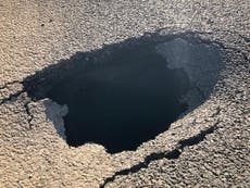 Sinkhole in middle of major road in Wales closes it in both directions