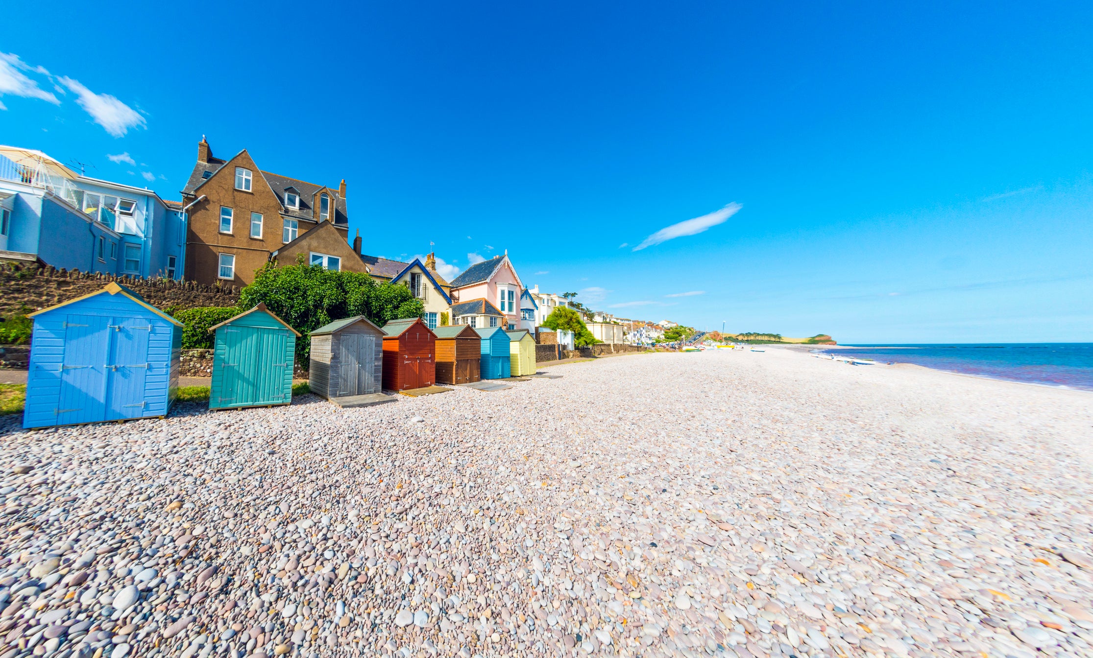 Beach huts on the golden sands of Budleigh Salterton, near Exmouth in Devon (iStock)