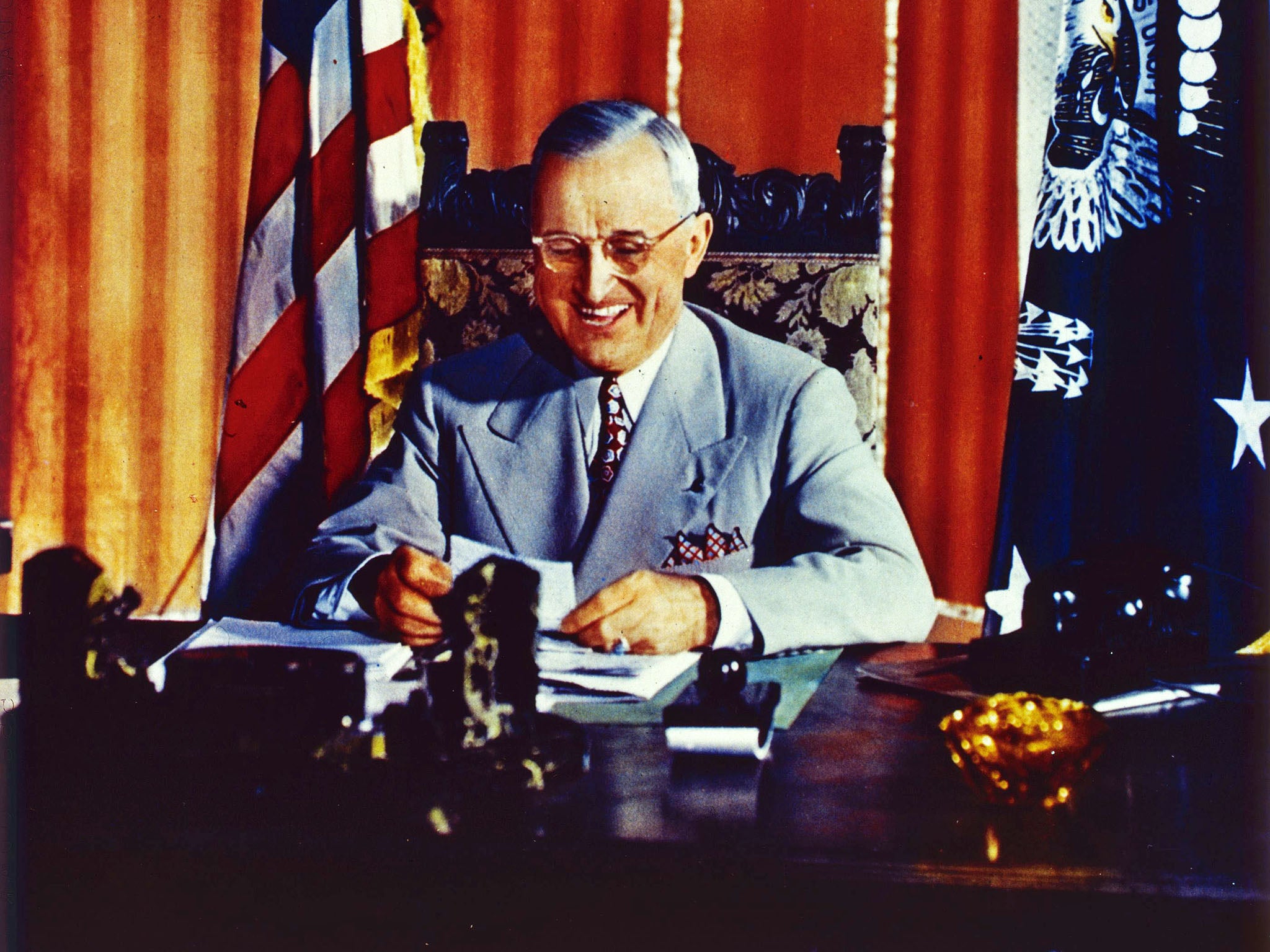 President Truman signs the Foreign Aid Assistance Act in 1947