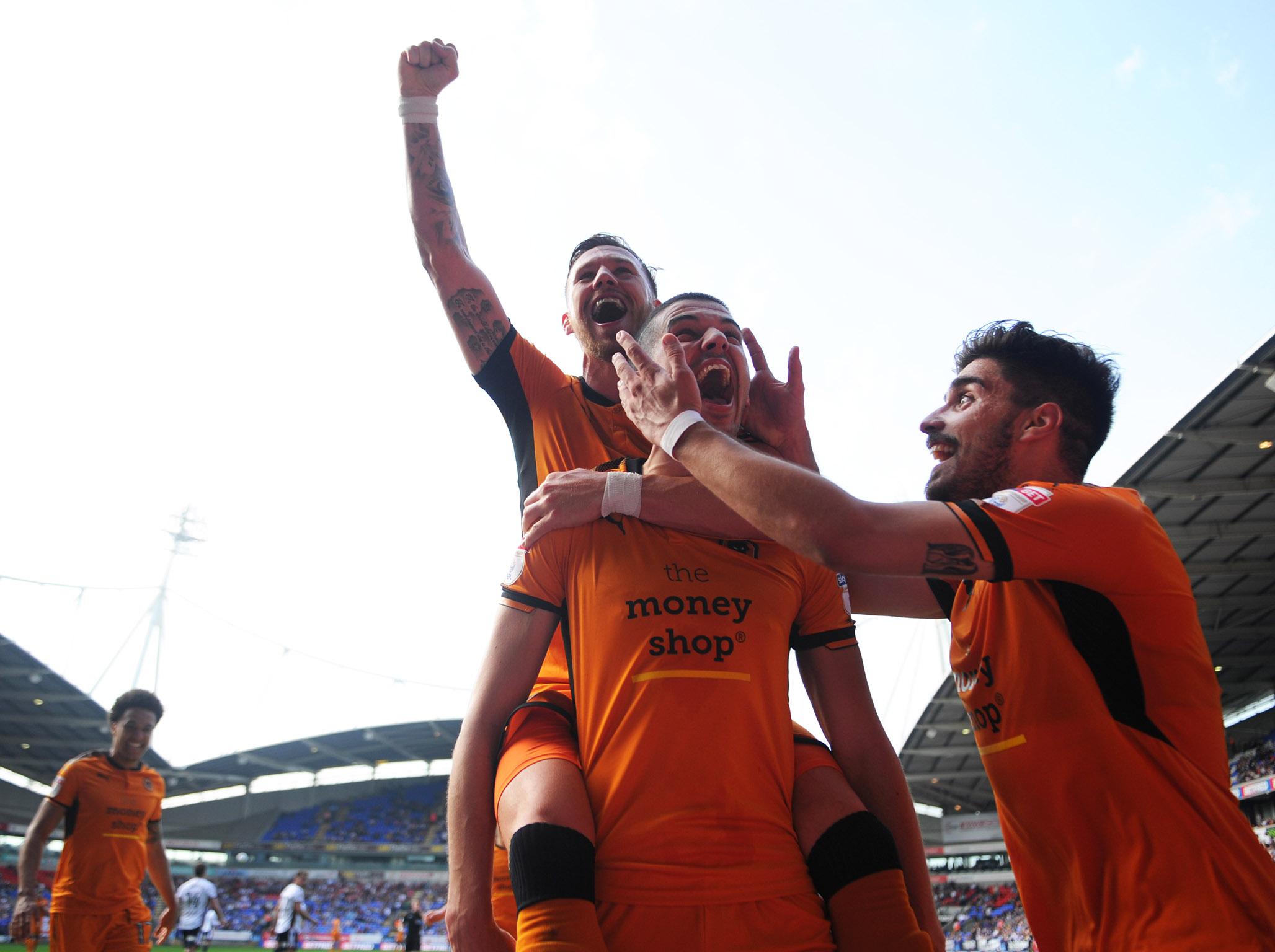 Conor Coady celebrates his penalty with his Wolves team-mates
