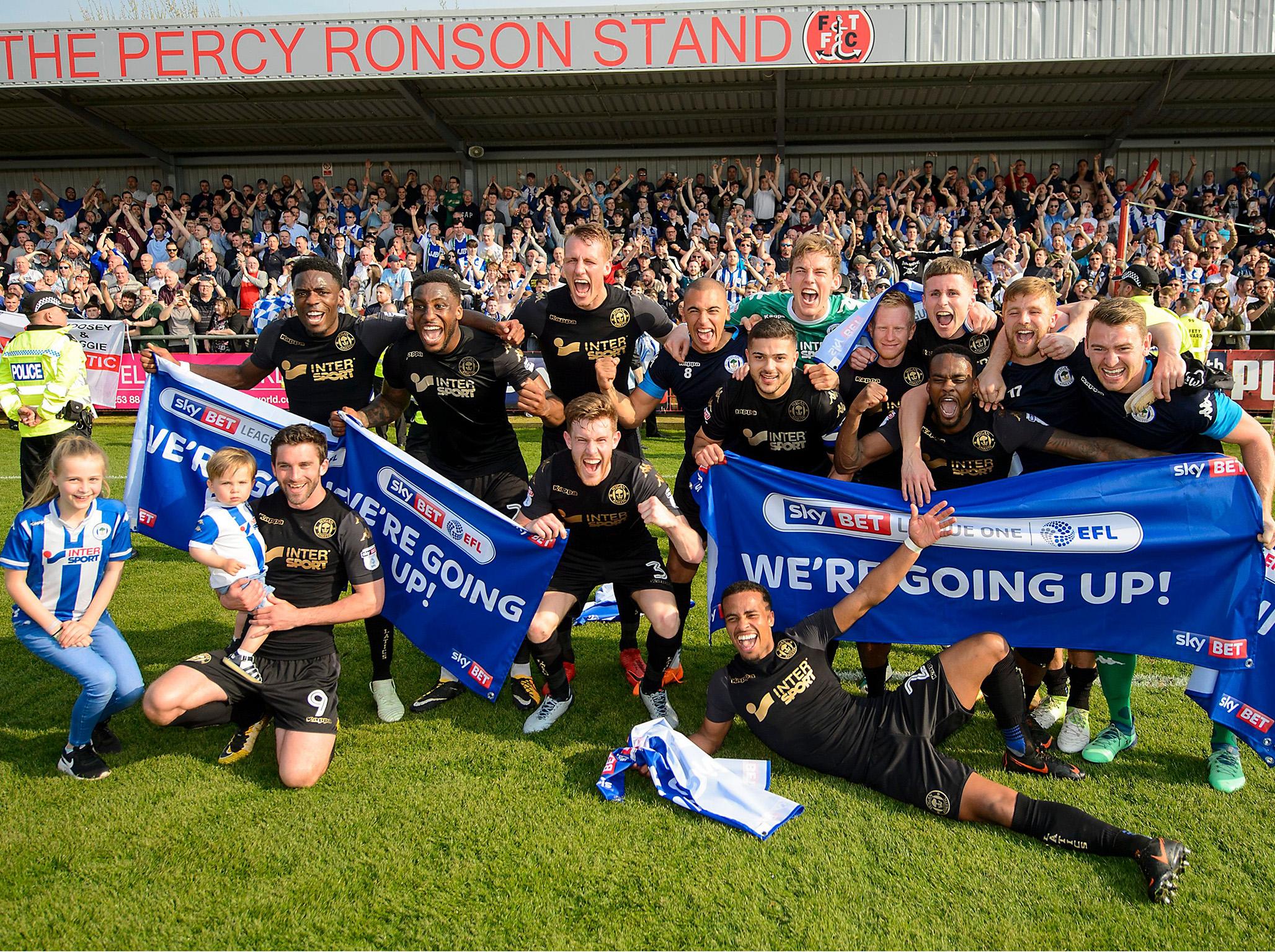Wigan Athletic celebrate their promotion to the second tier