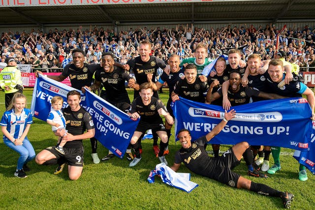 Wigan Athletic celebrate their promotion to the second tier