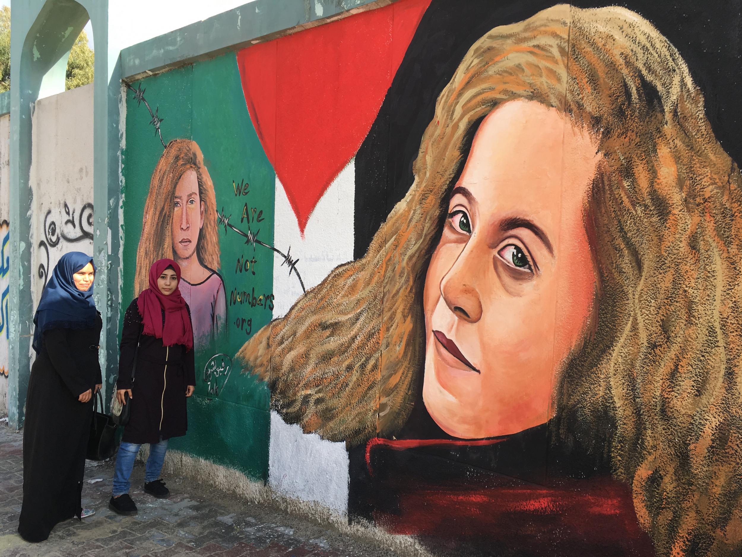 A mural by artist Rafiq al Sharif in Gaza of Palestinian teenager, Ahed Tamimi, who was jailed for slapping a soldier in the West Bank