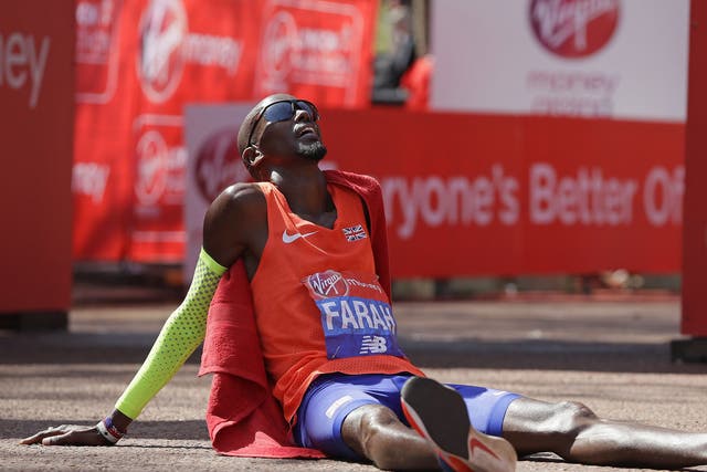 Britain's Mo Farah after crossing the finish line to place third in the Men's race in the London Marathon
