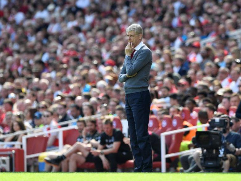 Wenger watched on in one of his final home games