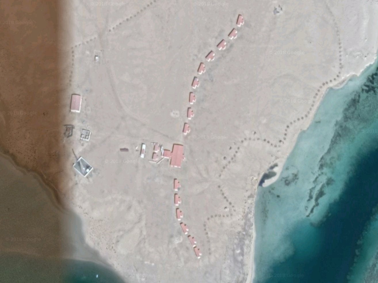 Satellite imagery of a plot of land roughly where the Arous resort used to be