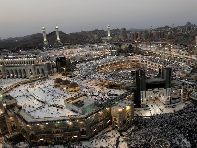 Muslims pray at the Grand mosque in Mecca, Saudi Arabia