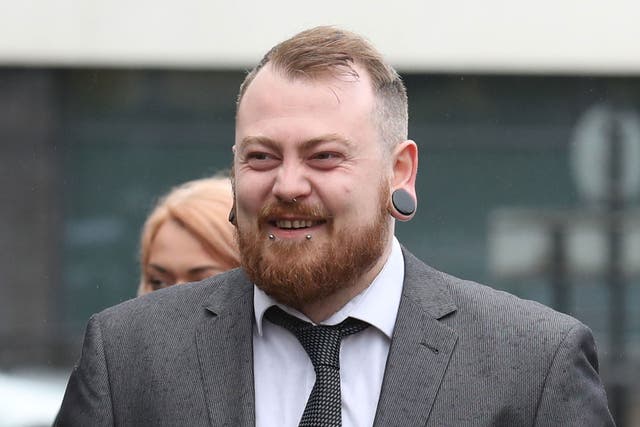 Mark Meechan arrives at Airdrie Sheriff Court for sentencing after he was found guilty of an offence under the Communications Act for posting a YouTube video of a dog giving Nazi salutes.
