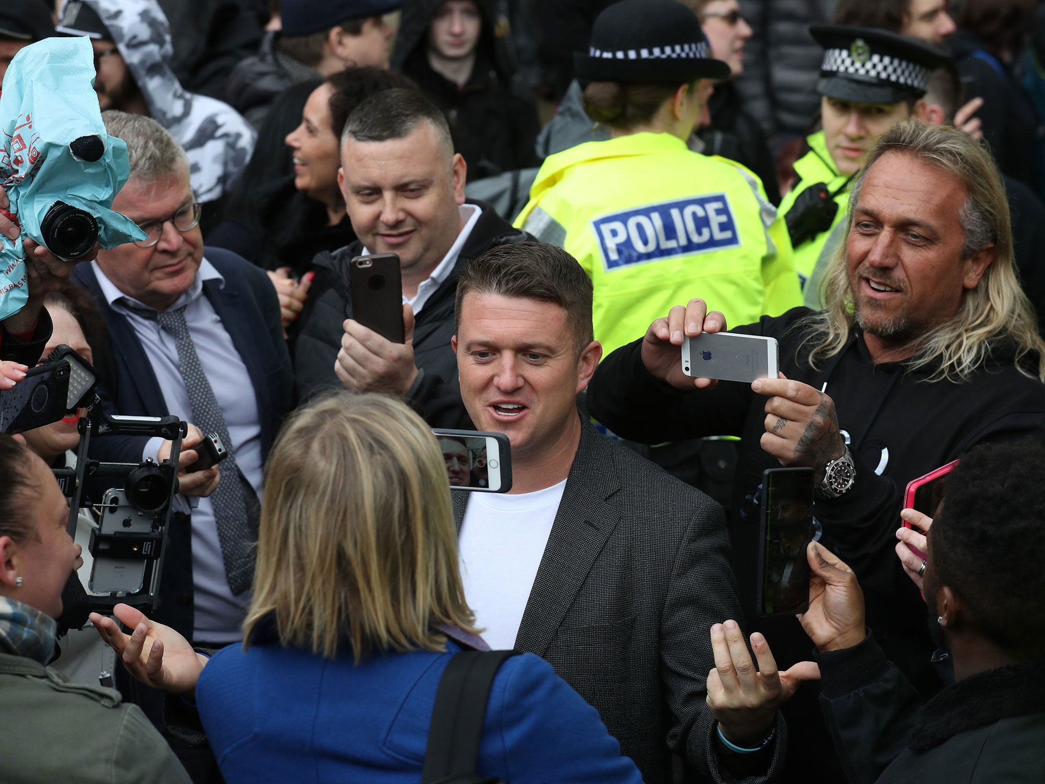 Former English Defence League leader Tommy Robinson (centre) outside Airdrie Sheriff Court in support of Mark Meechan