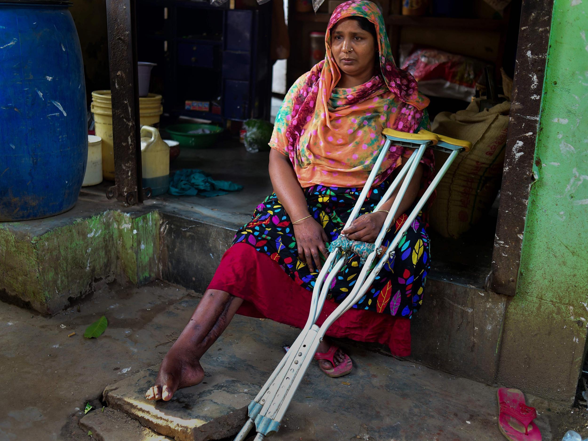 Nilufer Begum’s right leg was crippled after it was trapped under the weight of three dead bodies inside sandwiched floors
