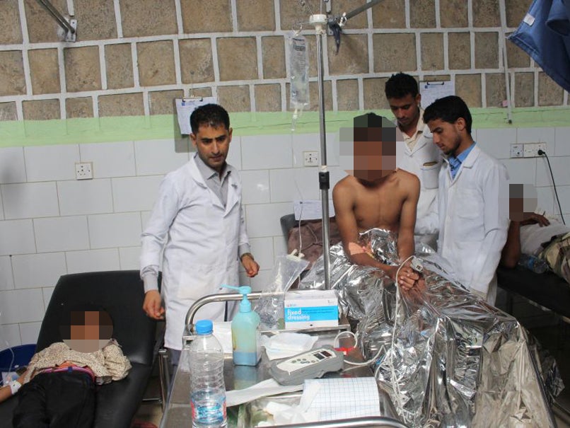 Doctors attend to people injured by airstrikes while attending a wedding in a village in northwestern Yemen, at a hospital in Hajjah