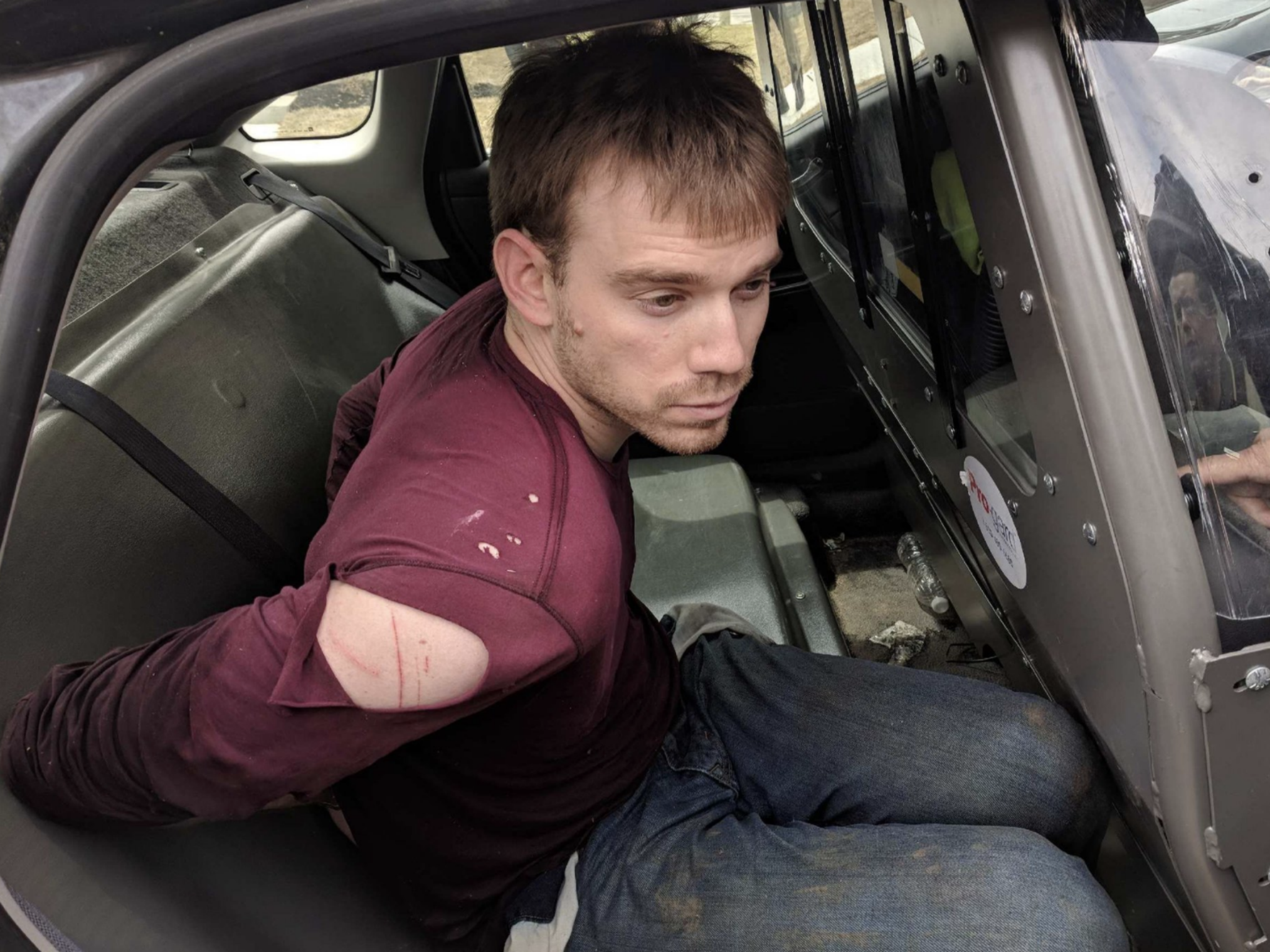 Police said they apprehended shooting suspect Travis Reinking in a wooded area