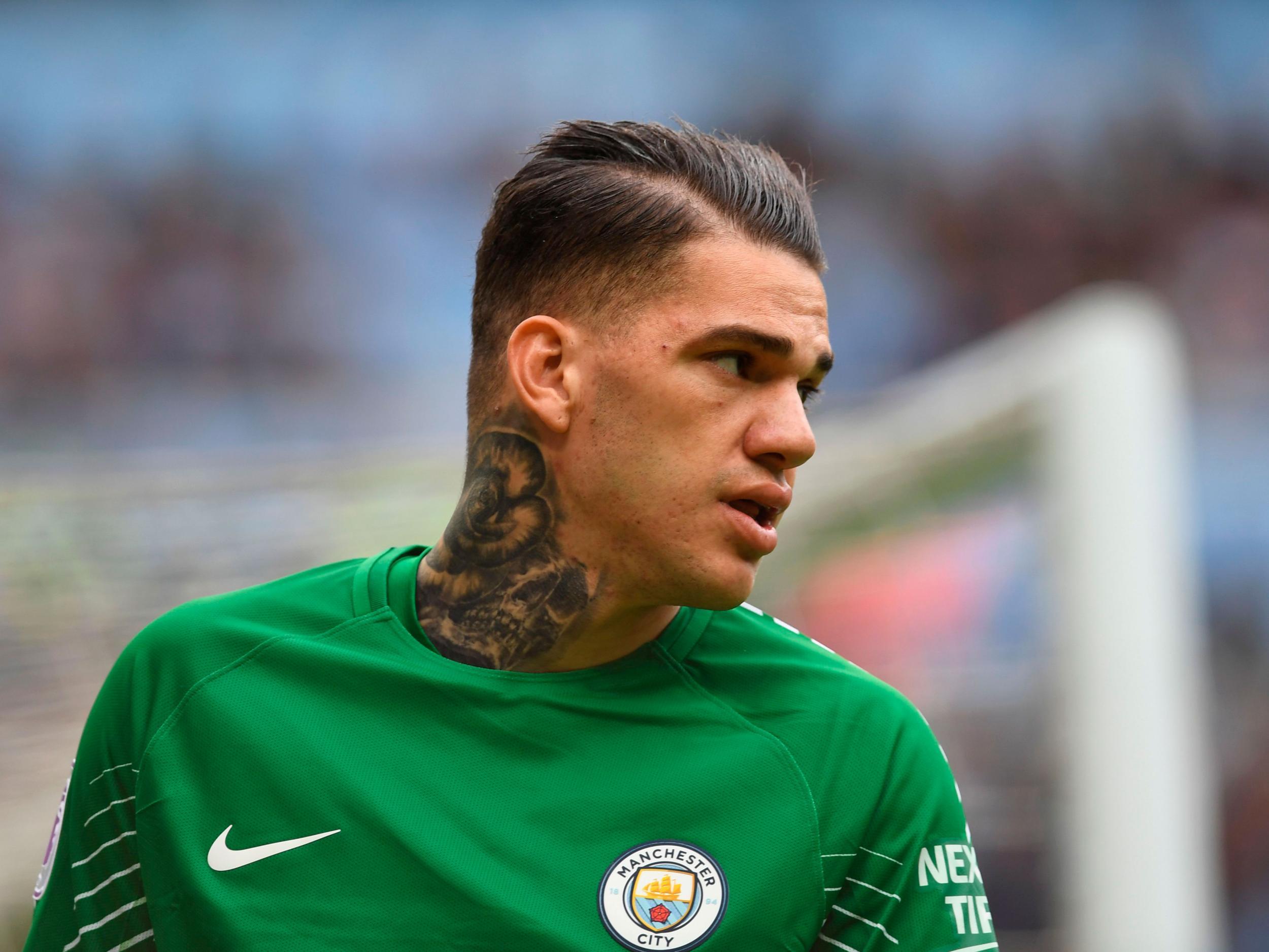  Ederson, the goalkeeper for Manchester City, looks on during a match.