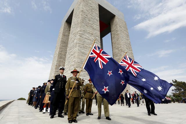 Australian and New Zealand Army Corps soldiers stand in front of the Turkish memorial during an international service marking the anniversary of Battle of Gallipoli in Canakkale, Turkey