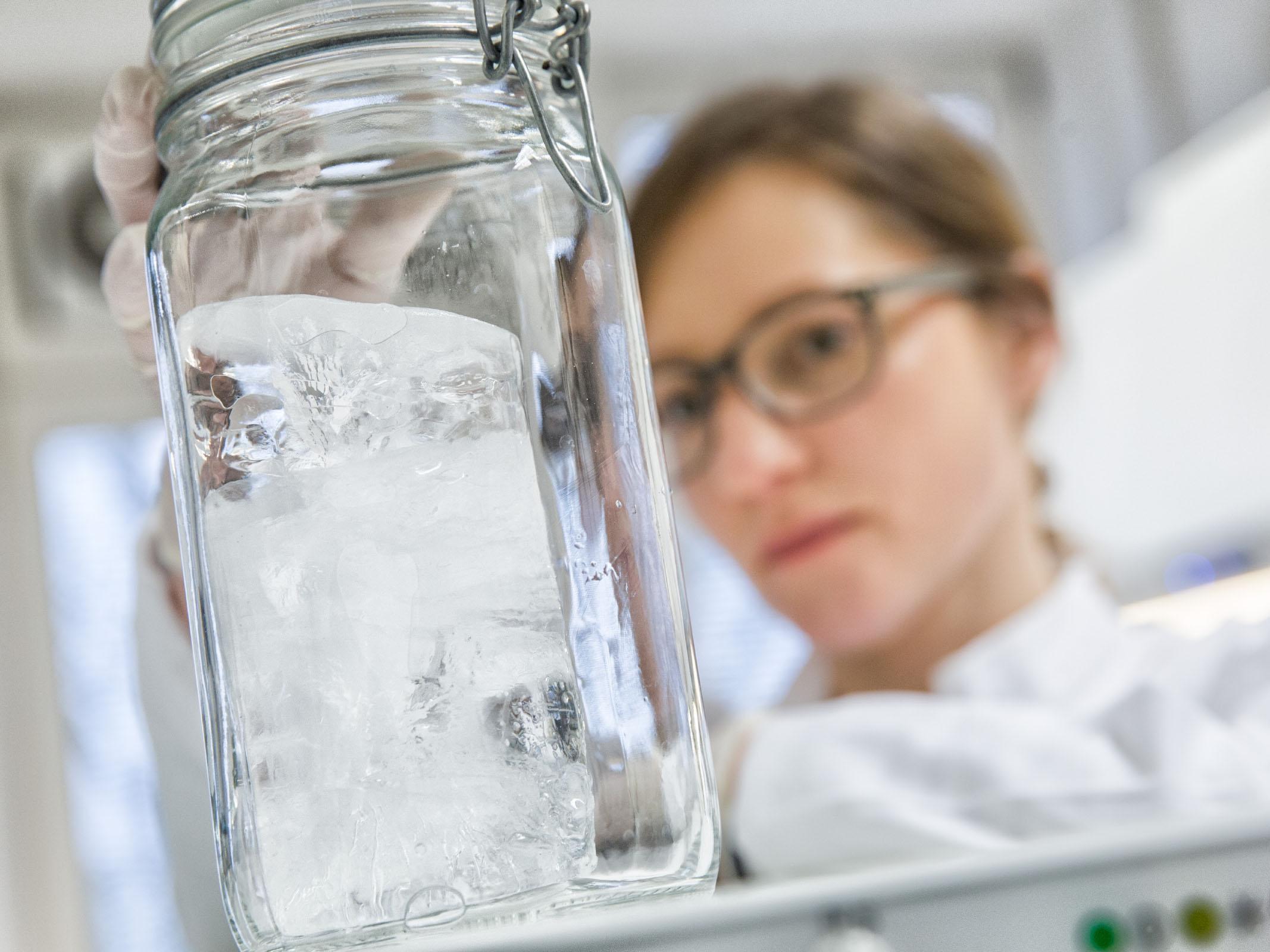 AWI scientist Julia Gutermann analysing an Arctic sea ice core for microplastic particles in a lab at the AWI Helgoland