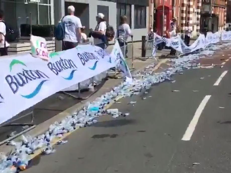 Water bottles litter Woolwich Road after London Marathon competitors passed by
