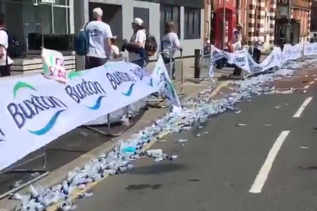 Water bottles litter Woolwich Road after London Marathon competitors passed by