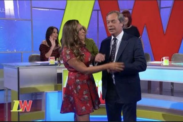 Kelly Brook patiently asked permission to blow a raspberry on Nigel Farage's belly