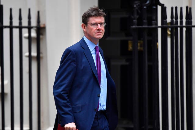 Business Secretary Greg Clark arrives to attend the weekly meeting of the cabinet at Downing Street