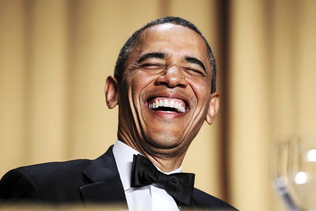 US president Barack Obama laughing at the annual dinner